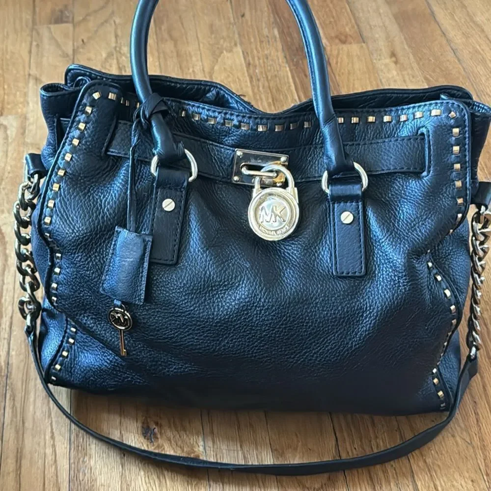 micheal kors black and gold stitched hamilton bag  with lock & key